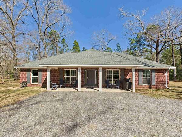 3.56 Acres of Land with Home for Sale in Milton, Florida