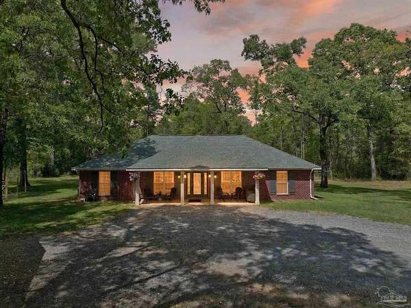 3.56 Acres of Land with Home for Sale in Milton, Florida