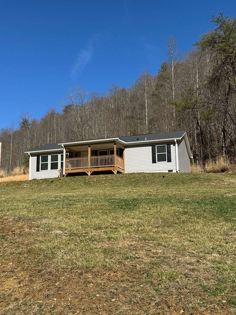 7 Acres of Land with Home for Sale in Marshall, North Carolina