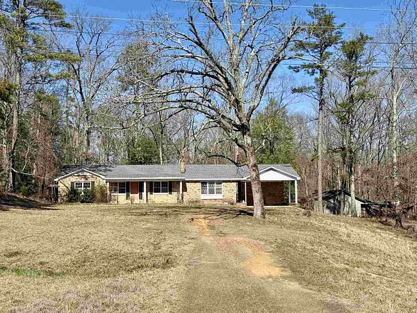 4 Acres of Land with Home for Sale in Selmer, Tennessee
