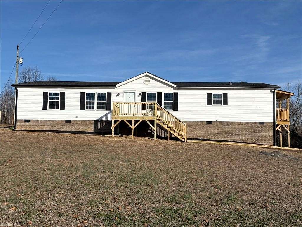 6 Acres of Land with Home for Sale in Staley, North Carolina