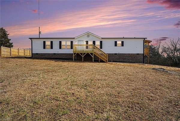 6 Acres of Land with Home for Sale in Staley, North Carolina