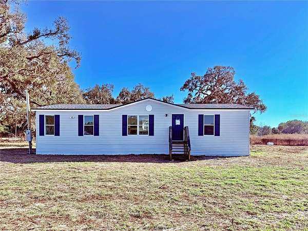 2.39 Acres of Land with Home for Sale in Zephyrhills, Florida