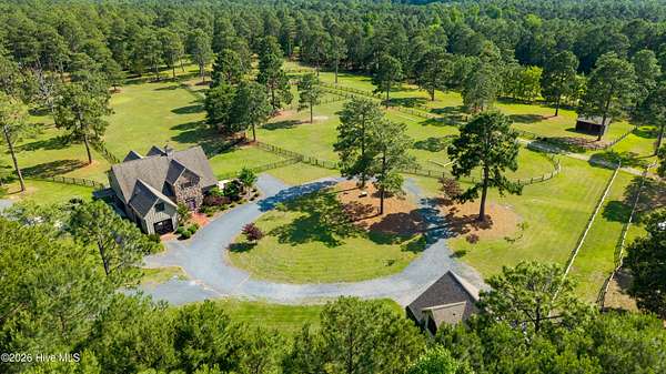 11.4 Acres of Land with Home for Sale in Vass, North Carolina