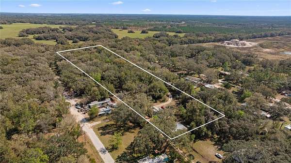 6.18 Acres of Land with Home for Sale in Spring Hill, Florida