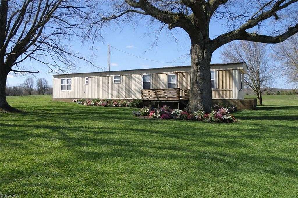 1.63 Acres of Land with Home for Sale in Denton, North Carolina