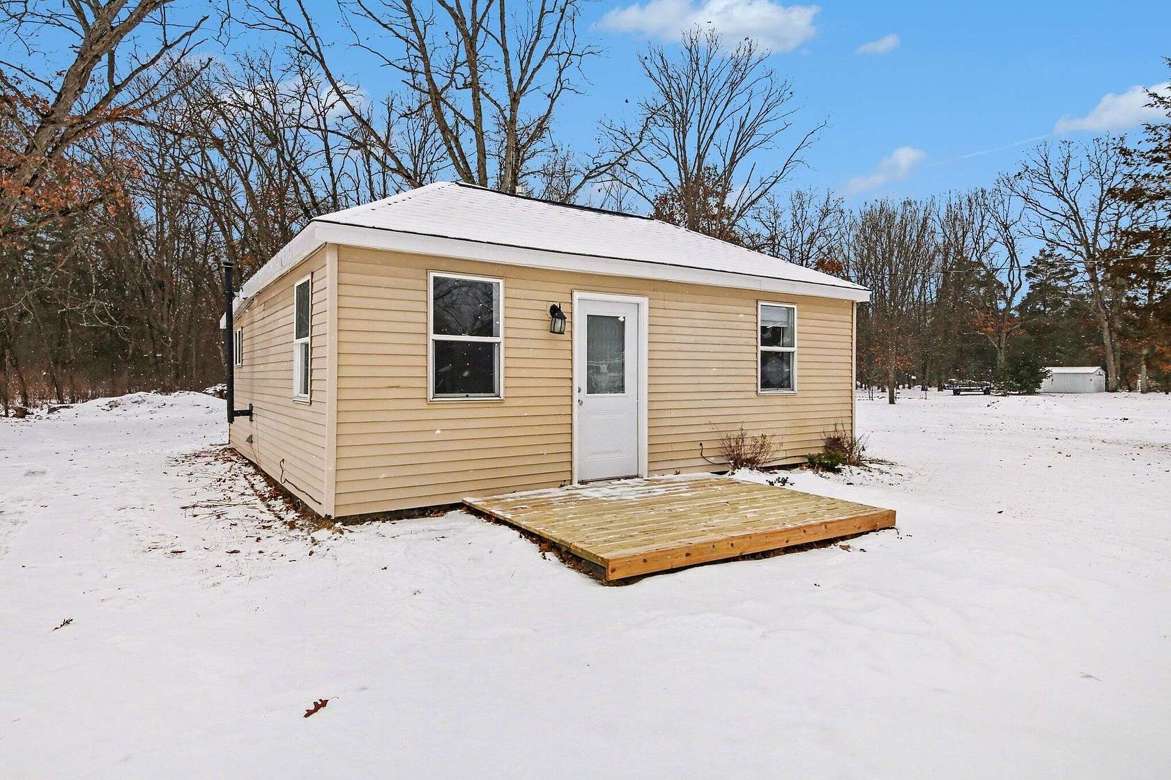 4 Acres of Land with Home for Sale in Cedar Springs, Michigan