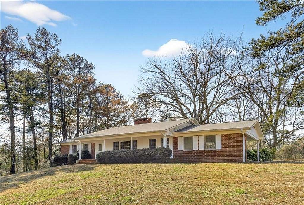 1.89 Acres of Land with Home for Sale in Lithonia, Georgia