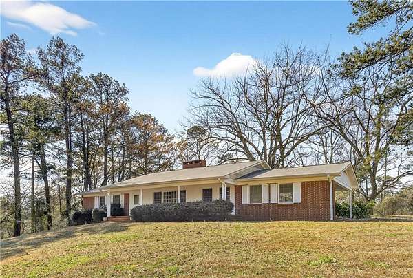 1.89 Acres of Land with Home for Sale in Lithonia, Georgia