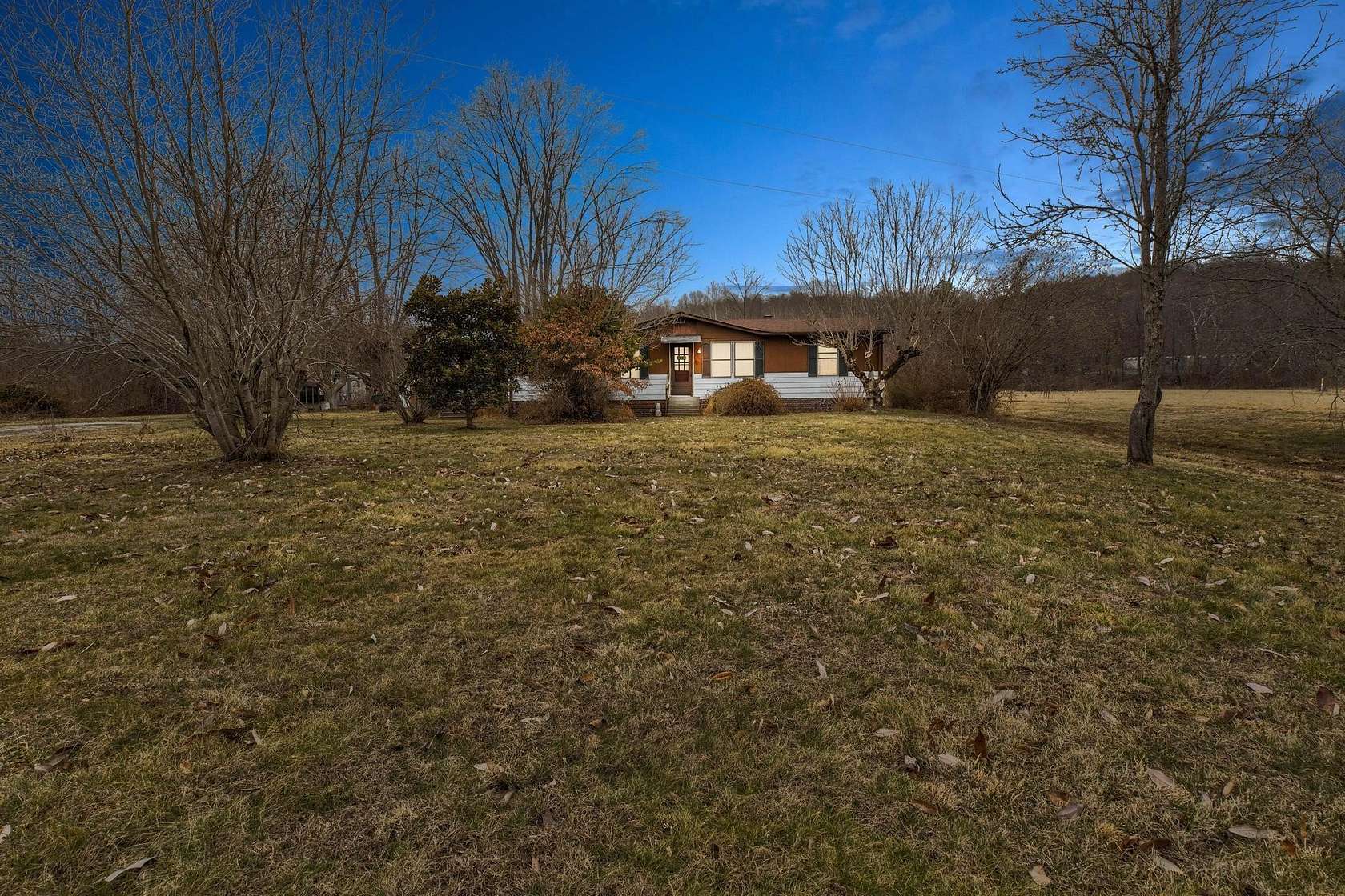 8 Acres of Land with Home for Sale in Jeffersonville, Kentucky