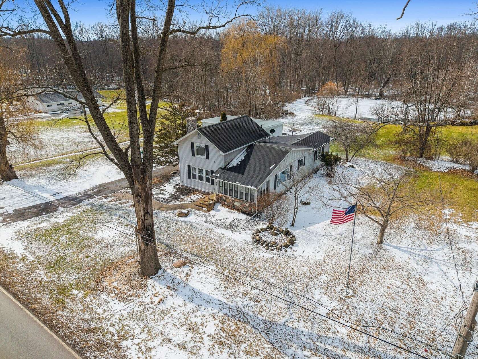 2.43 Acres of Land with Home for Sale in Jackson, Michigan