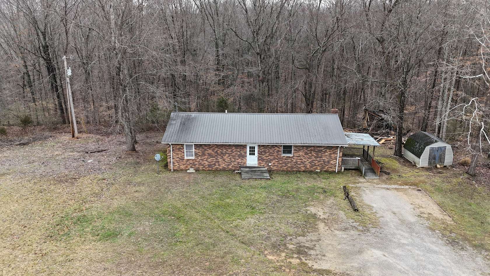 12.7 Acres of Land with Home for Auction in Manchester, Tennessee