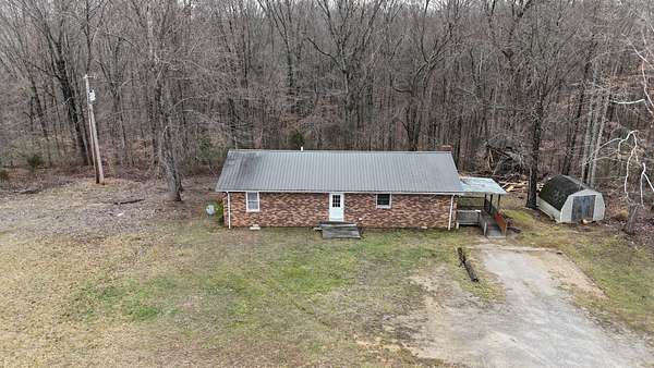 12.7 Acres of Land with Home for Auction in Manchester, Tennessee