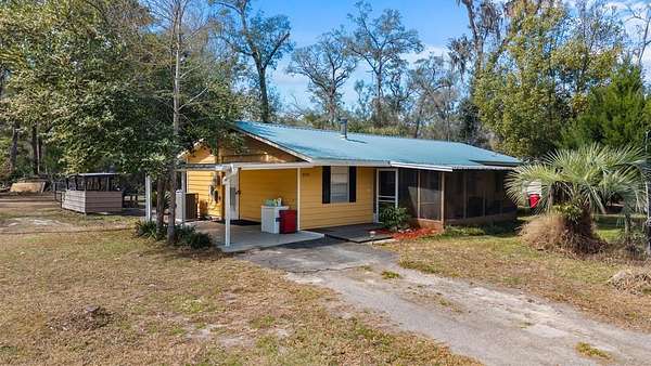 2 Acres of Land with Home for Sale in Fanning Springs, Florida