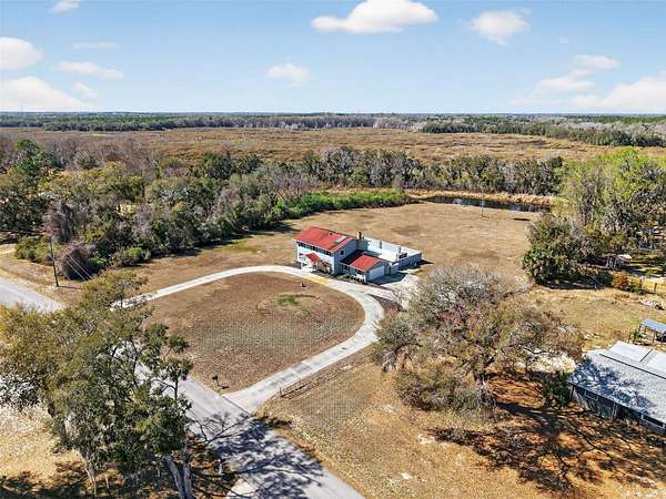 2.46 Acres of Land with Home for Sale in Inverness, Florida