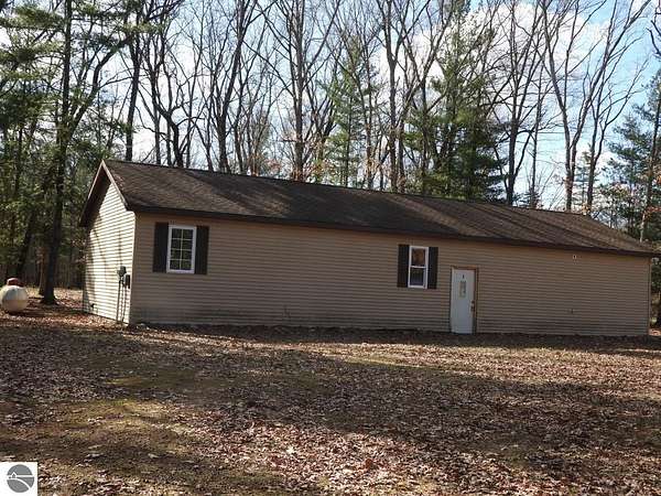 5 Acres of Land with Home for Sale in Irons, Michigan