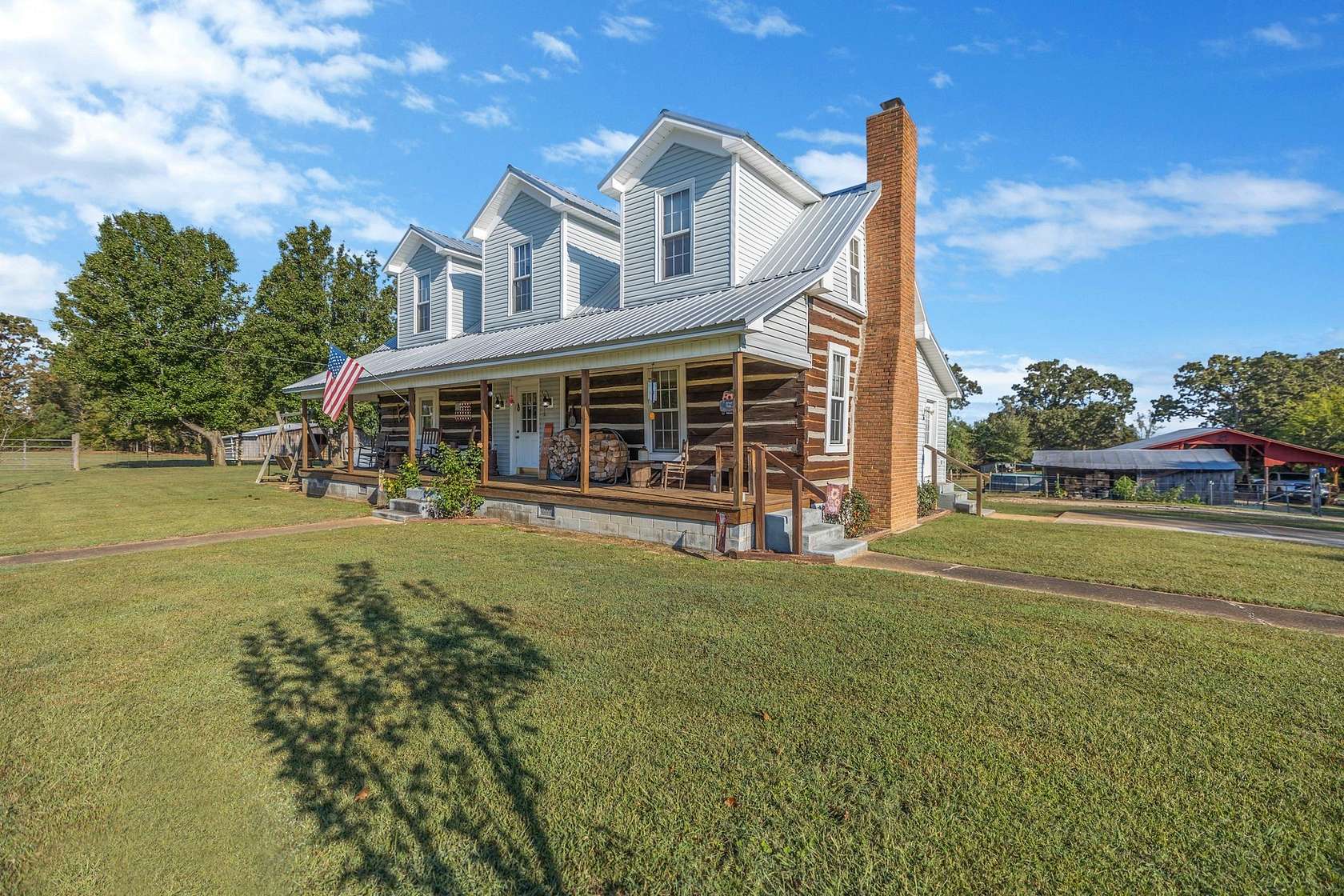 6.69 Acres of Land with Home for Sale in Buena Vista, Tennessee