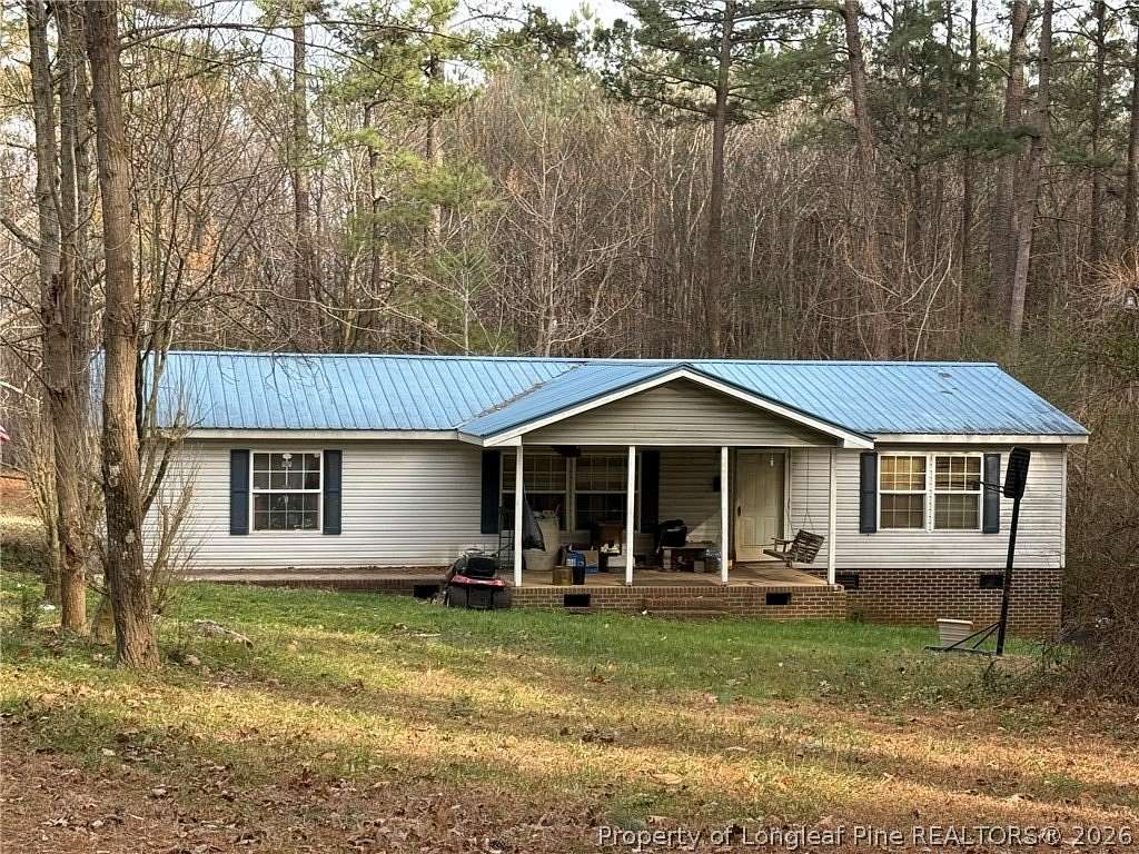 5 Acres of Land with Home for Sale in Sanford, North Carolina
