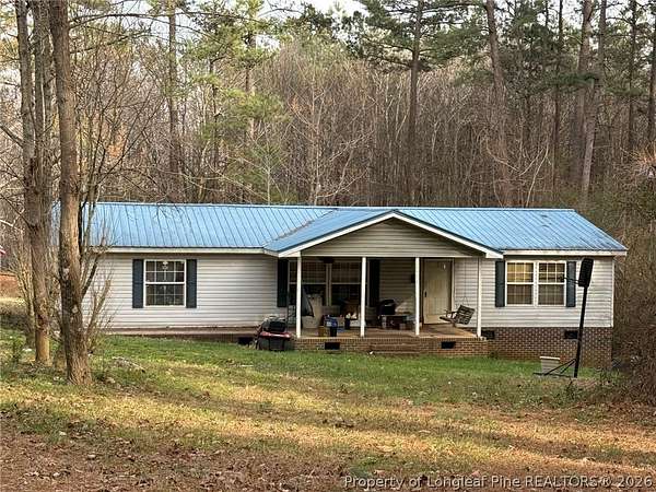 5 Acres of Land with Home for Sale in Sanford, North Carolina