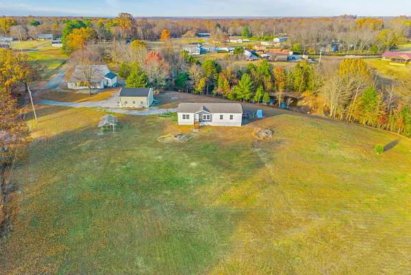 6.37 Acres of Land with Home for Sale in Charlotte, Tennessee