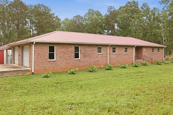 2.3 Acres of Land with Home for Sale in New Concord, Kentucky