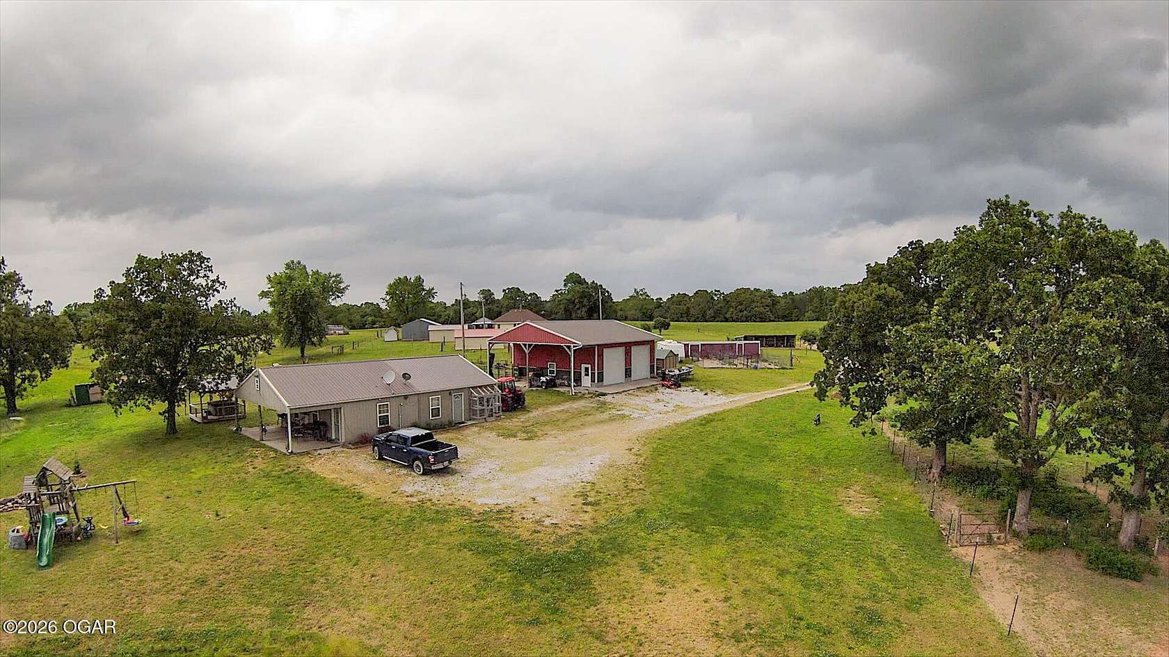 83 Acres of Recreational Land with Home for Sale in Lamar, Missouri