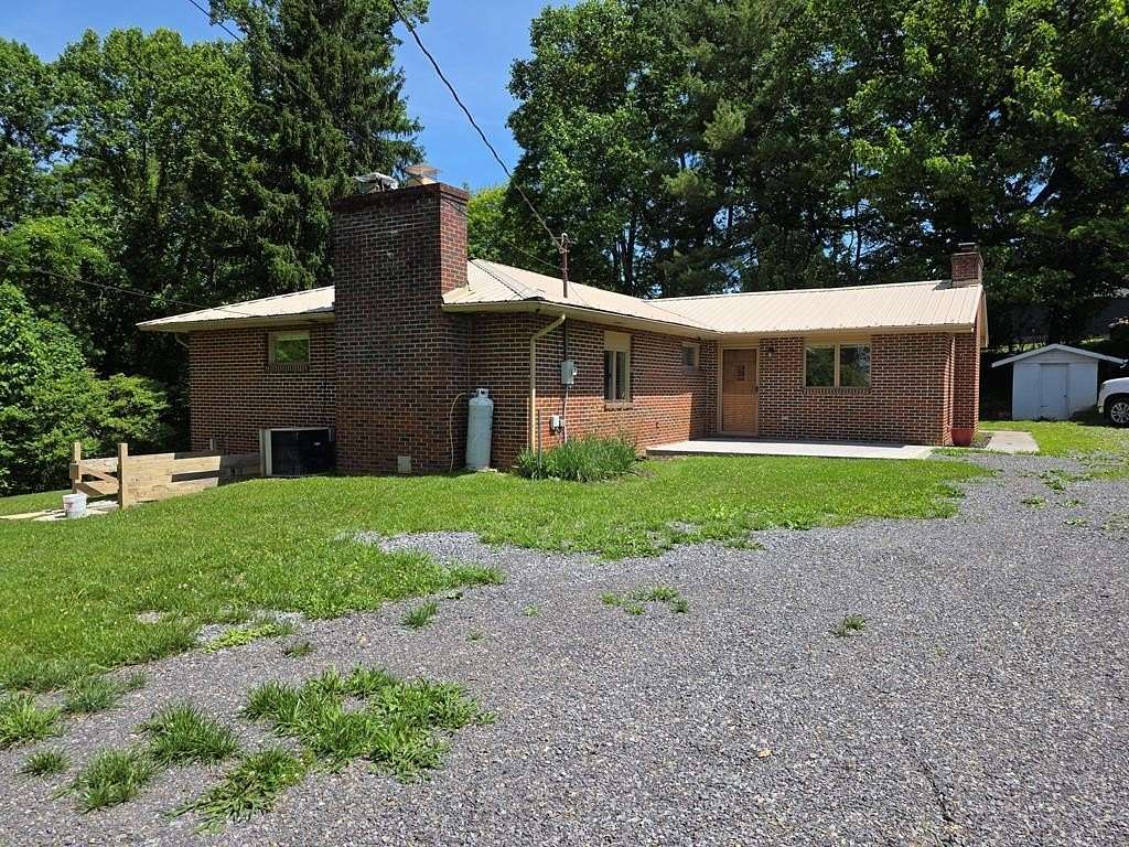 1.5 Acres of Land with Home for Sale in Pounding Mill, Virginia