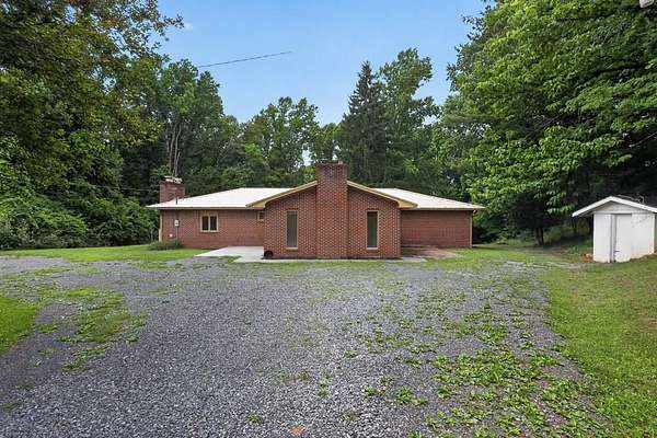 1.5 Acres of Land with Home for Sale in Pounding Mill, Virginia
