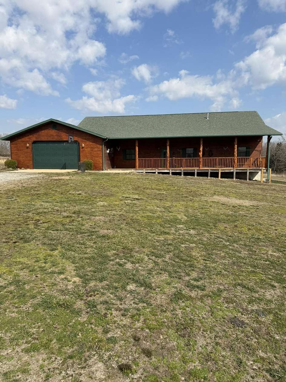 114 Acres of Land with Home for Sale in Dora, Missouri