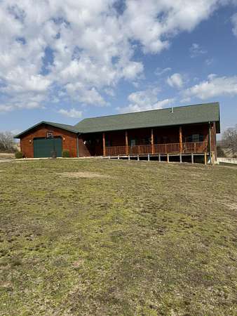 114 Acres of Land with Home for Sale in Dora, Missouri