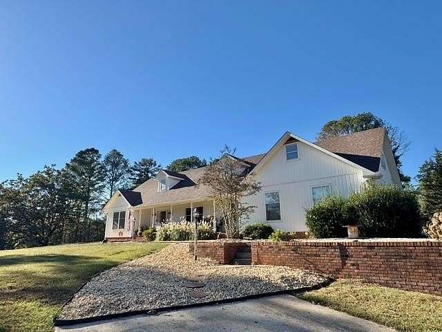 28 Acres of Agricultural Land with Home for Sale in Russellville, Alabama