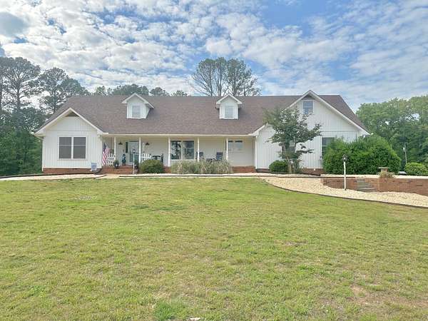 28 Acres of Agricultural Land with Home for Sale in Russellville, Alabama