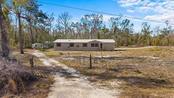 1.5 Acres of Land with Home for Sale in Old Town, Florida