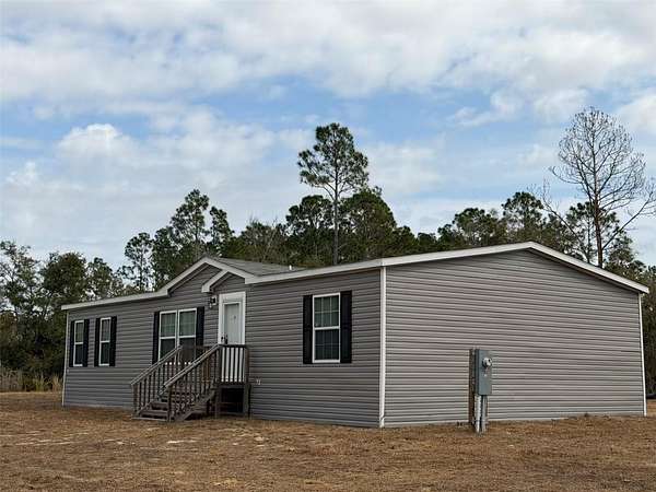 7.19 Acres of Land with Home for Sale in Perry, Florida