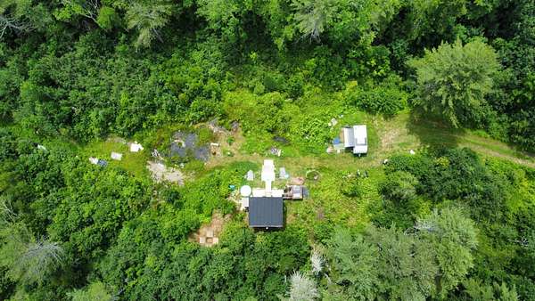 10 Acres of Land with Home for Sale in Swanville, Maine