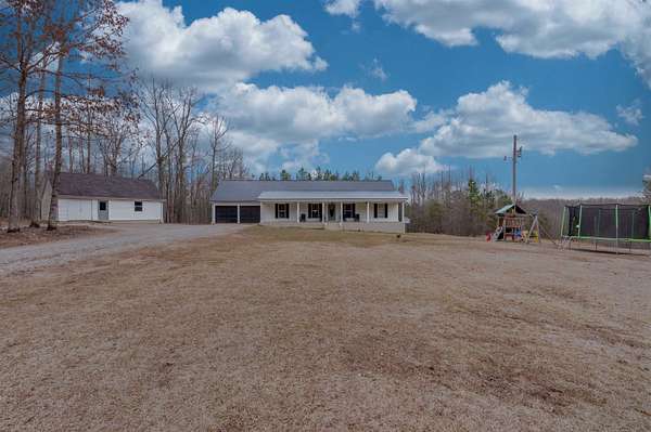 10 Acres of Recreational Land with Home for Sale in Cypress Inn, Tennessee
