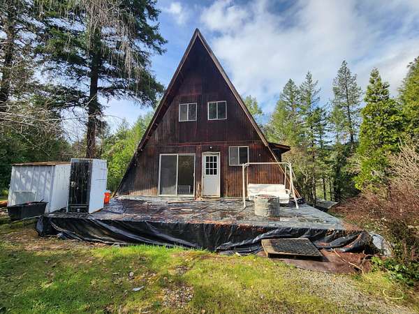 4.57 Acres of Land with Home for Sale in Cave Junction, Oregon