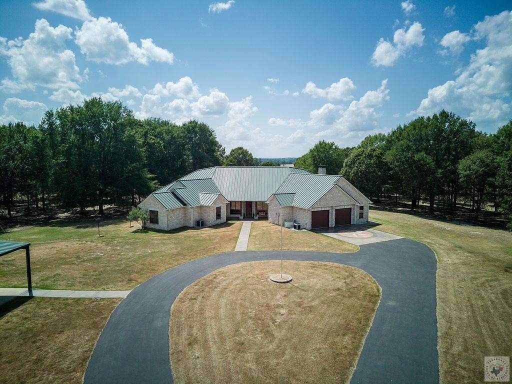 14.6 Acres of Land with Home for Sale in Linden, Texas