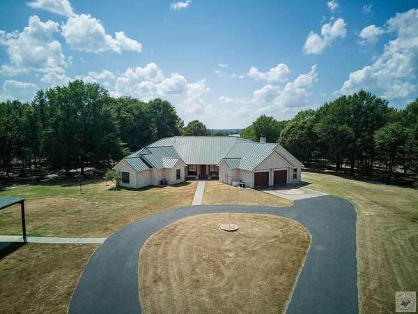 14.6 Acres of Land with Home for Sale in Linden, Texas