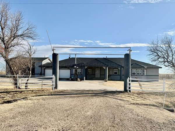 5 Acres of Land with Home for Sale in Dumas, Texas