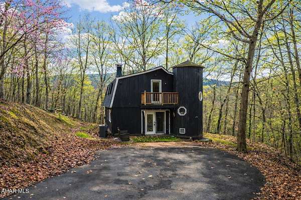 10 Acres of Recreational Land with Home for Sale in Manns Choice, Pennsylvania