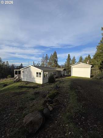12.6 Acres of Land with Home for Sale in Glide, Oregon
