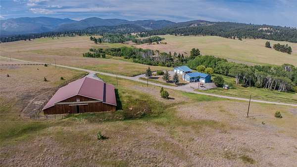 30.9 Acres of Recreational Land with Home for Sale in Goldcreek, Montana