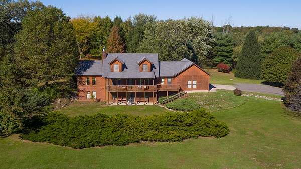 10.3 Acres of Land with Home for Sale in Chelsea, Michigan