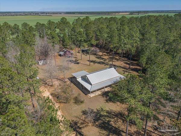 10 Acres of Land with Home for Sale in Jay, Florida