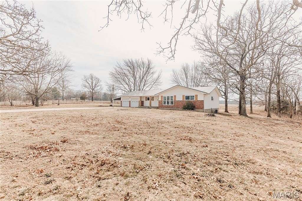 9.72 Acres of Land with Home for Sale in Dixon, Missouri