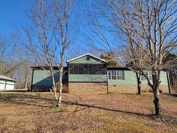 5.16 Acres of Land with Home for Sale in Erin, Tennessee