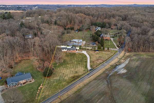 1.68 Acres of Land with Home for Auction in Canal Fulton, Ohio