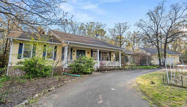 7.12 Acres of Land with Home for Sale in Roland, Arkansas