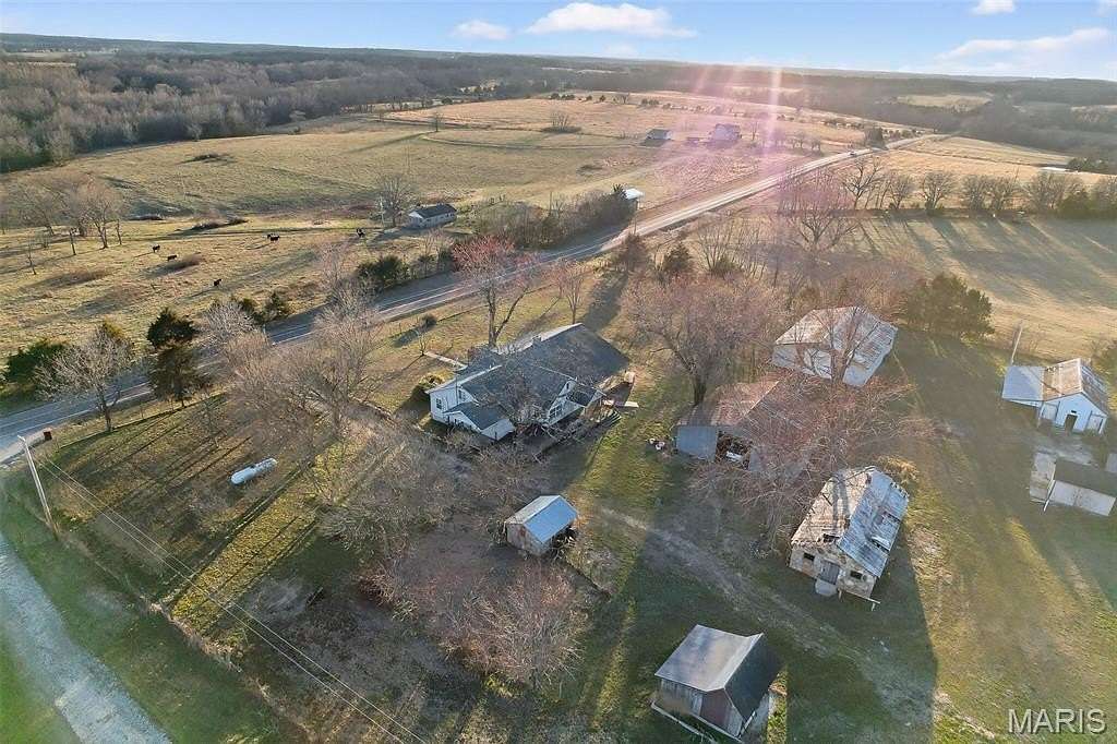 6.89 Acres of Land with Home for Sale in Lebanon Township, Missouri